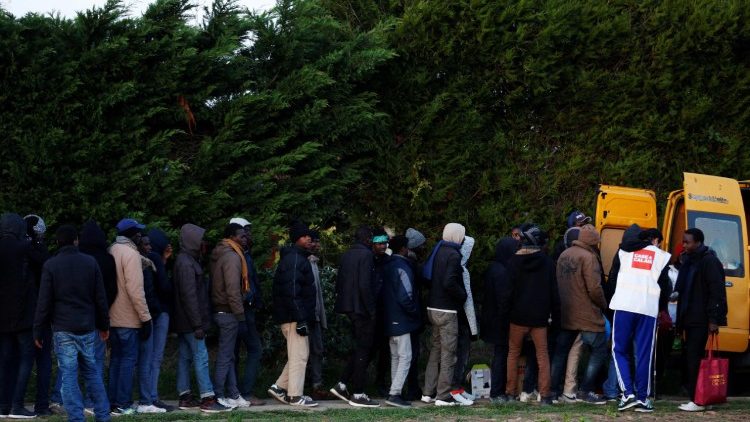 Migrants pictured one year on from the dismantling of the Calais "Jungle" camps