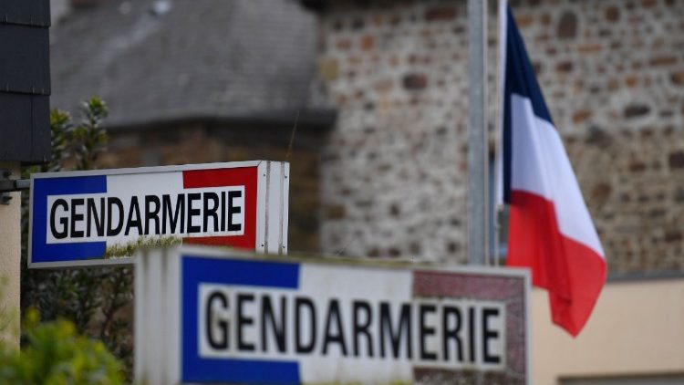 A French flag is lowered half mast as a tribute to French Lieutenant Colonel Arnaud Beltramme 