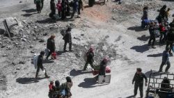 topshot-syria-conflict-ghouta-1522059482207.jpg