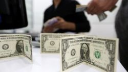 iran-politics-currency-1523355481519.jpg