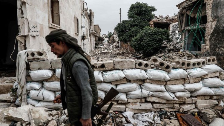 A Turkish-backed Syrian fighter in Tadef, in the eastern countryside of Aleppo province