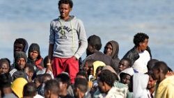 topshot-italy-europe-migrants-rescue-1528888745785.jpg