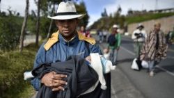 topshot-venezuela-migration-journey-family-1535533288350.jpg