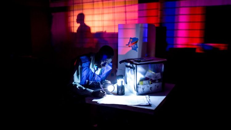 Congo electoral agent at the close of voting on Sunday