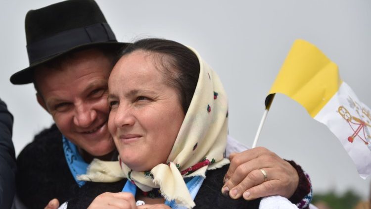 Faithful in traditional costume attend the Divine Liturgy in Blaj