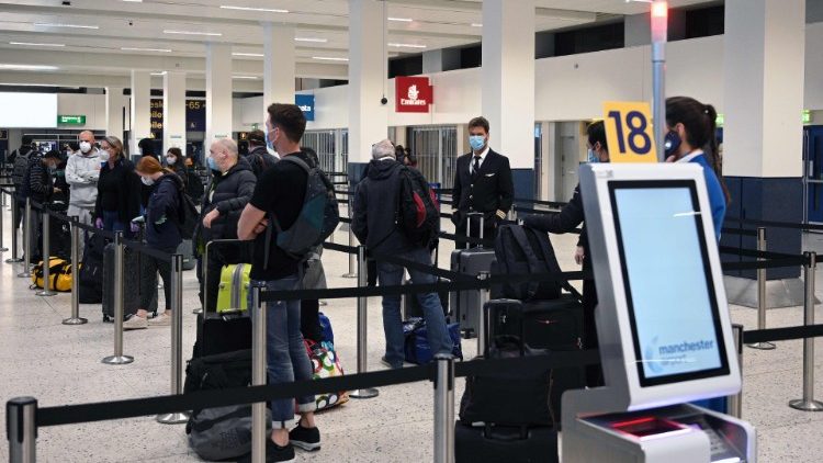 Travelers at an airport in England