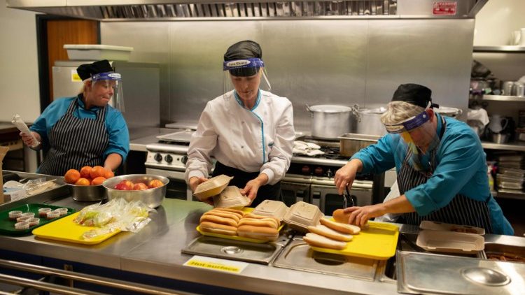 Staff prepare school lunches