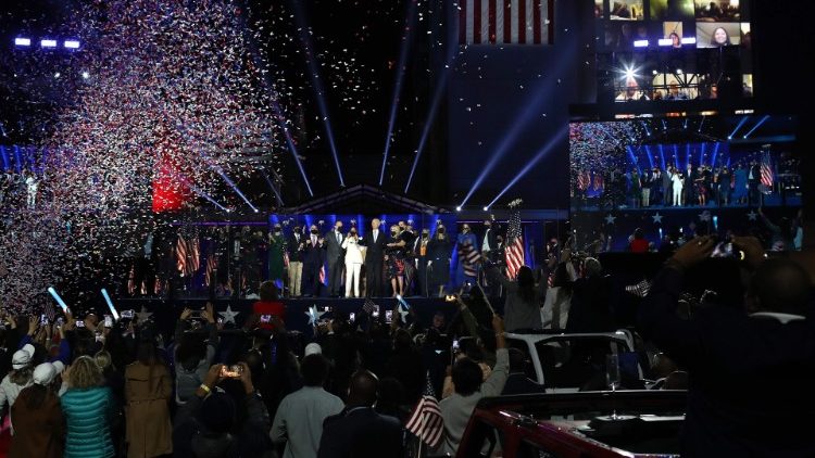 President-elect Joe Biden and vice President.elect Kamala Harris salute the crowd after delivering their speeches inn Wilmington, Delaware