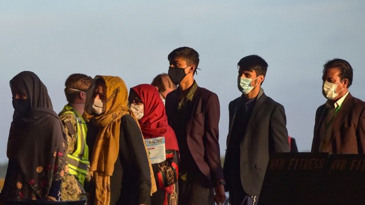 A group of Afghan citizens being evacuated from the country