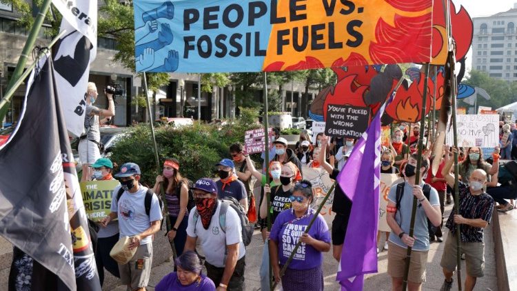 Climate activists participate in protest march in Washington, DC, US. 
