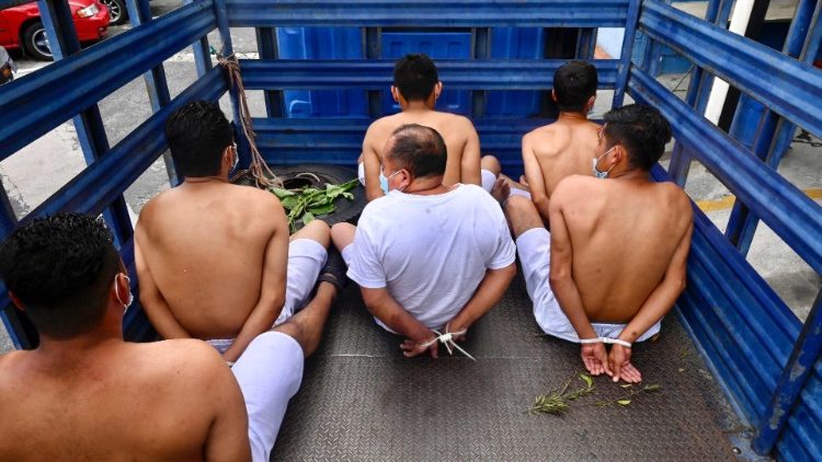 Suspected gang members are detained in Soyapango, near San Salvador