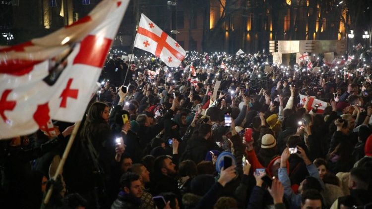 Pro-Western supporters protest outside the parliament in Tbilisi