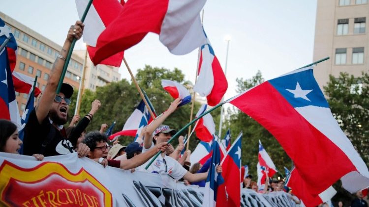 Chilean voters celebrate the results of Sunday's referendum