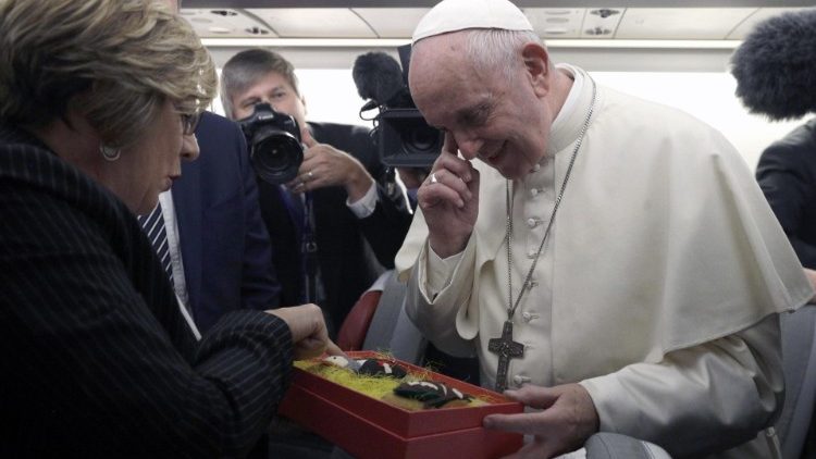 Pope Francis on plane on route to Thailand