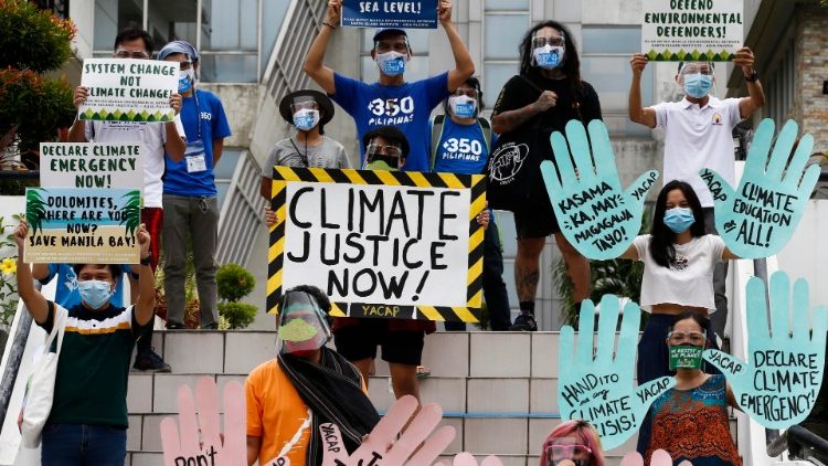 Filipinos in Quezon City, Philippines, protesting against climate change.  