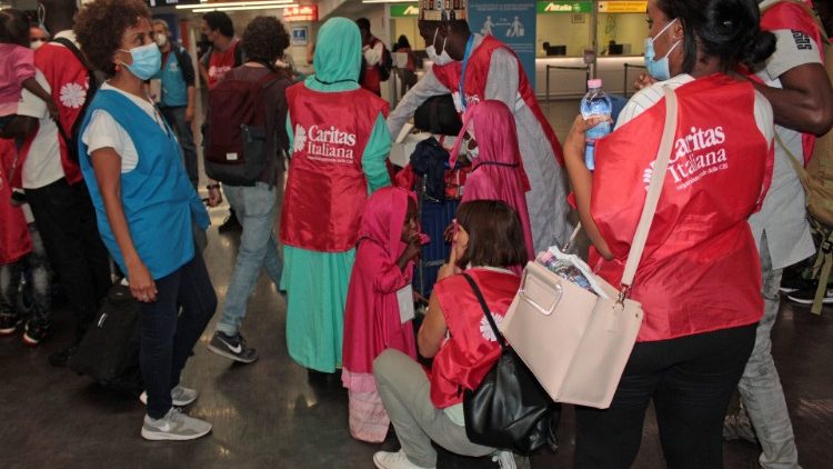 Archive photo of the arrival of refugees at Rome Airport thanks to a humanitarian corridor