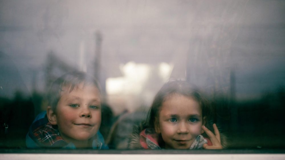 Refugees from Ukraine are waiting at the railway station in Chelm