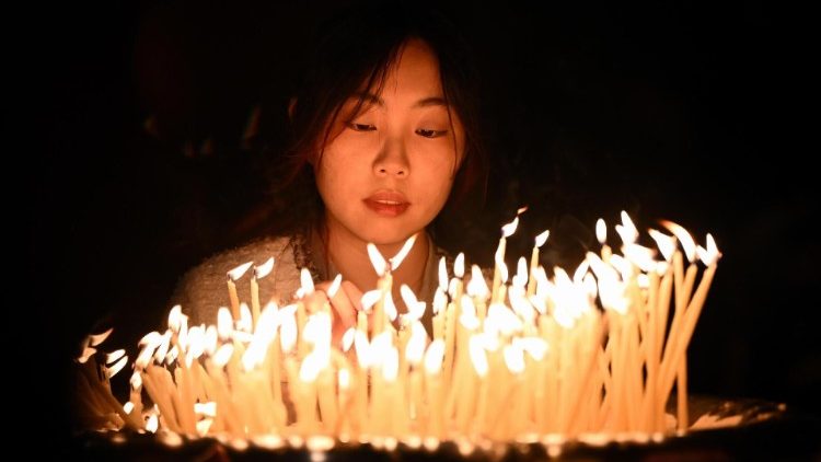 A worshipper at Easter Mass in Melbourne
