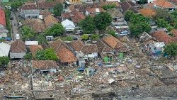 aerial-view-of-a-damaged-area-after-tsunami-h-1545927232299.JPG