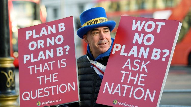 An anti-Brexit campaignery demonstrates outside Downing Street in London