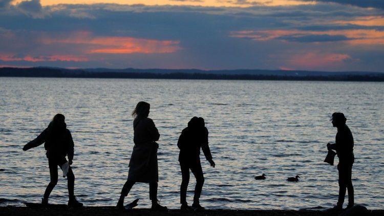 People at a lake on the outskirts of  Minsk