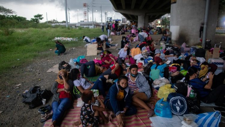 Hundreds of passengers, including Filipinos, stranded outside Manila airport because of cancelled flights.