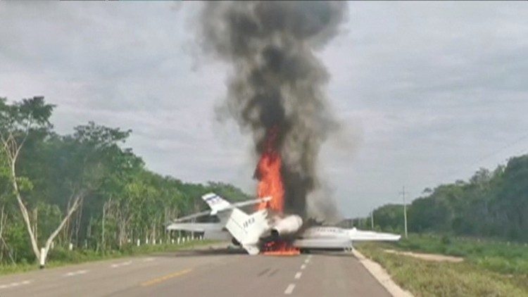 Video grab of a plane suspected of carrying drugs that was reportedly set alight after allegedly being intercepted by soldiers in Quintana Roo state, Mexico
