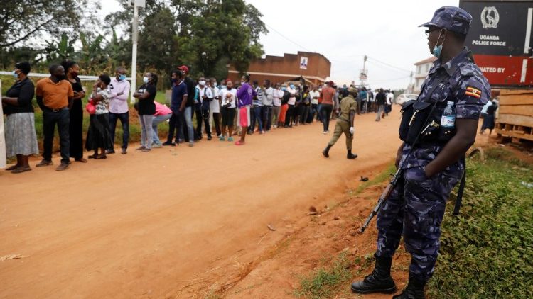 Voters queue to cast their ballots in the presidential elections in Uganda
