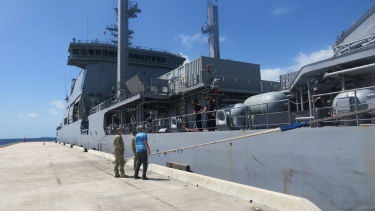 New Zealand's HMNZS Aotearoa docked on Tongatapu island to bring water supplies