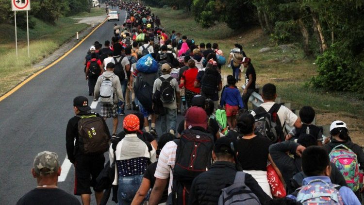 Migrants continue walking in a caravan to reach the U.S. border through Mexico, in Escuintla
