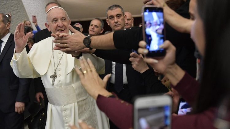 Pope Francis greets pilgrims at the Wednesday General Audience