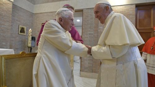 Pope Francis praying for  Pope emeritus Benedict XVI in his time of loss