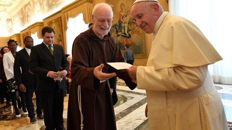 Pope Francis with staff from Sophia University