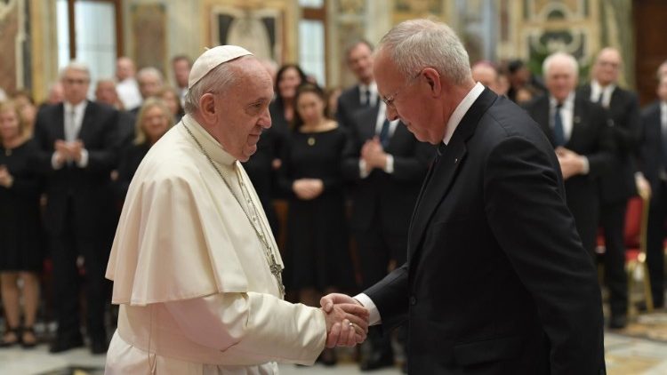 Pope Francis greets Supreme Knight Carl Anderson at the audience with members of the Knights of Columbus