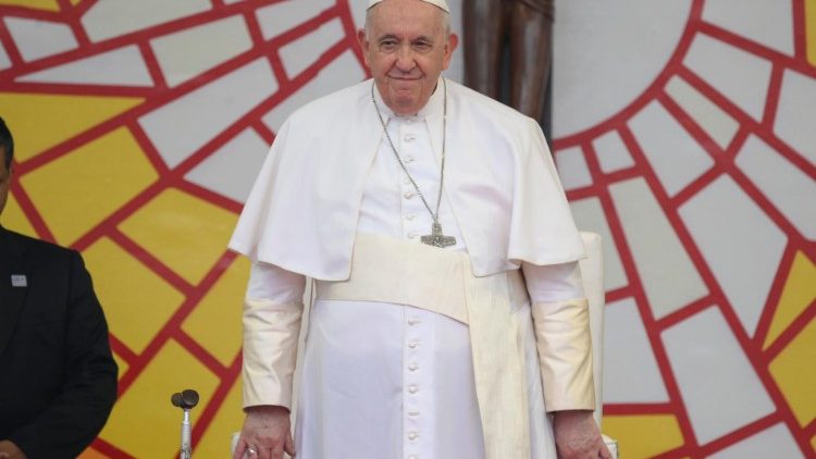 Pope Francis smiles at the meeting with young people