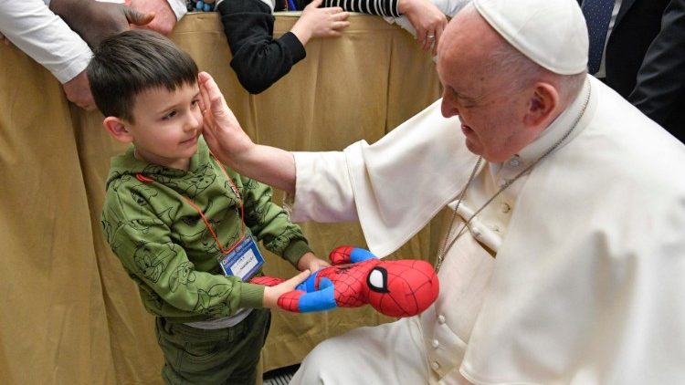 Pope Francis greets refugee families who have arrived via Humanitarian Corridors