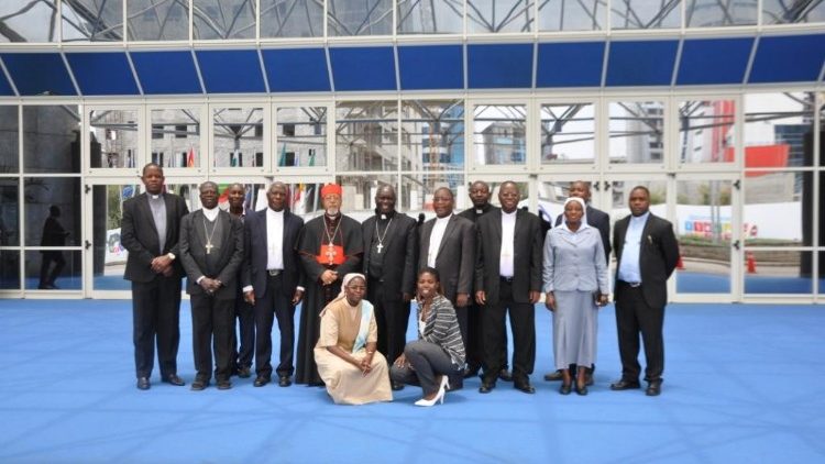  AMACEA Plenary Assembly organizers outside the venue where the assembly is being held.