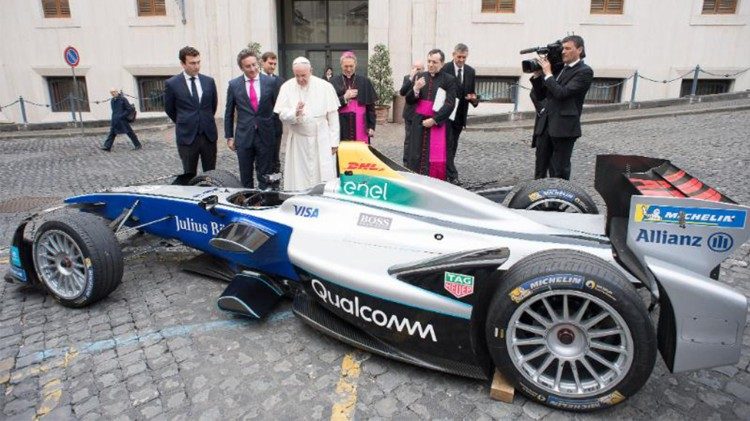 Pope Francis blesses one of the electric racing cars that will compete in the Formula E race in Rome on 14 April 