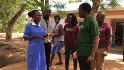 Mary (infermiera) e Peter Lochoro (Cuamm) nel centro di salute di Siripi, Rhino Camp.JPG