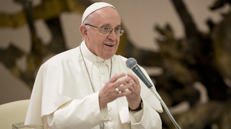 Pope Francis delivering an address.