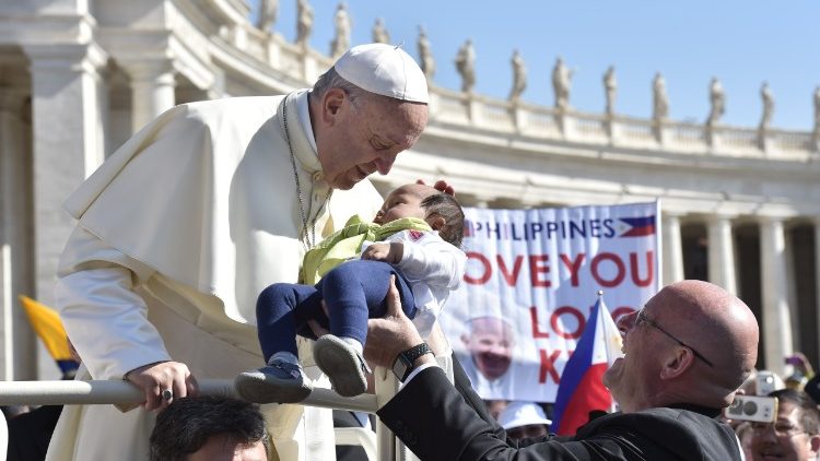 Pope Francis greeting pilgrims at General Audience in St Peter's Square