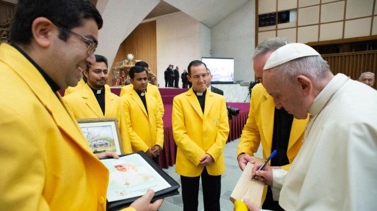 Pope Francis autografing a bat for the cricket club in his hometown, Buenos Aires, Argentina. 