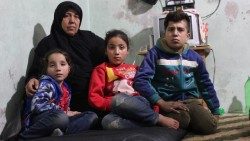 Siria profughi bambini Caritas guerra 21aem.jpg