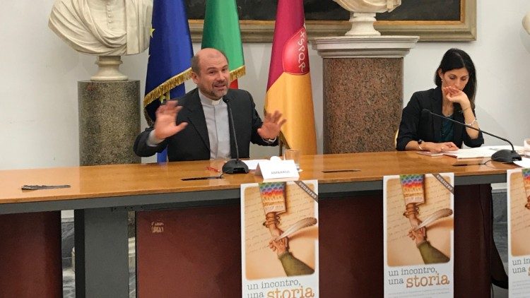 caritas migranti tavolo direttore Ambarus stretto.JPG