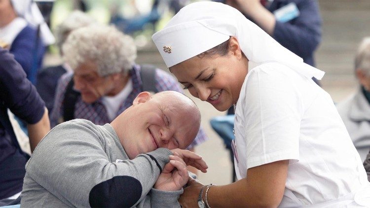 A volunteer and a pilgrim