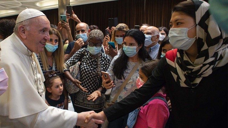 Pope Francis meets with refugees and homeless people gathered to view the film-documentary "Francesco"