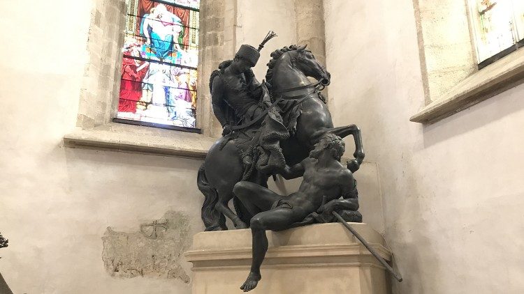 Bronze scrupture of "St Martin and Beggar",  St Martin's Cathedral, Bratisplava