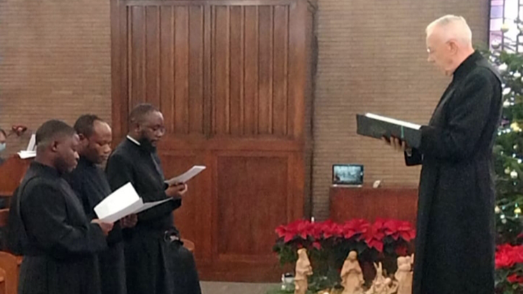Rome: Three Brothers of Charity make their perpetual vows before the Superior General, Brother René Stockman.