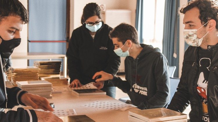 Young people placing labels on organic products