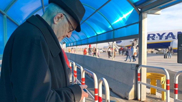 Cardinal Czerny prays before his departure from Rome